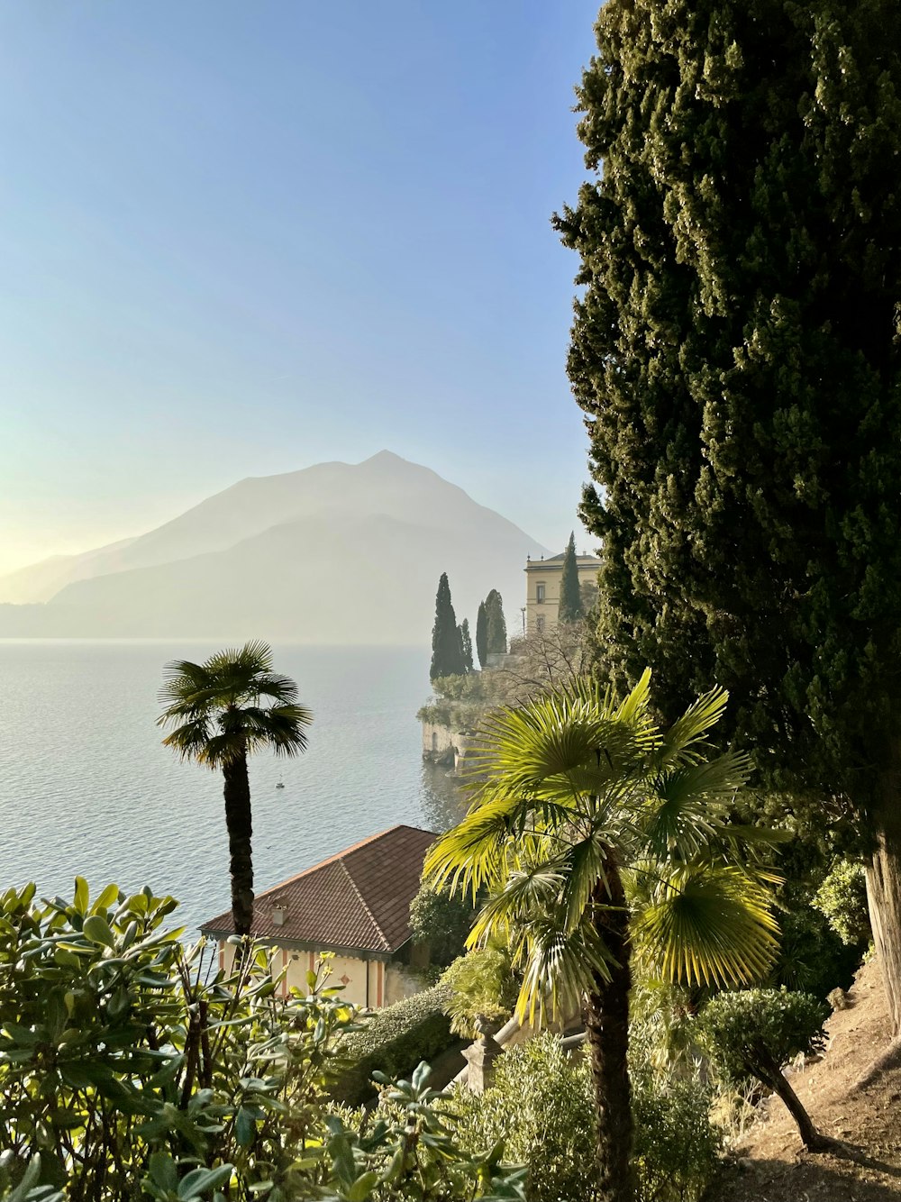 a view of a body of water with a mountain in the background