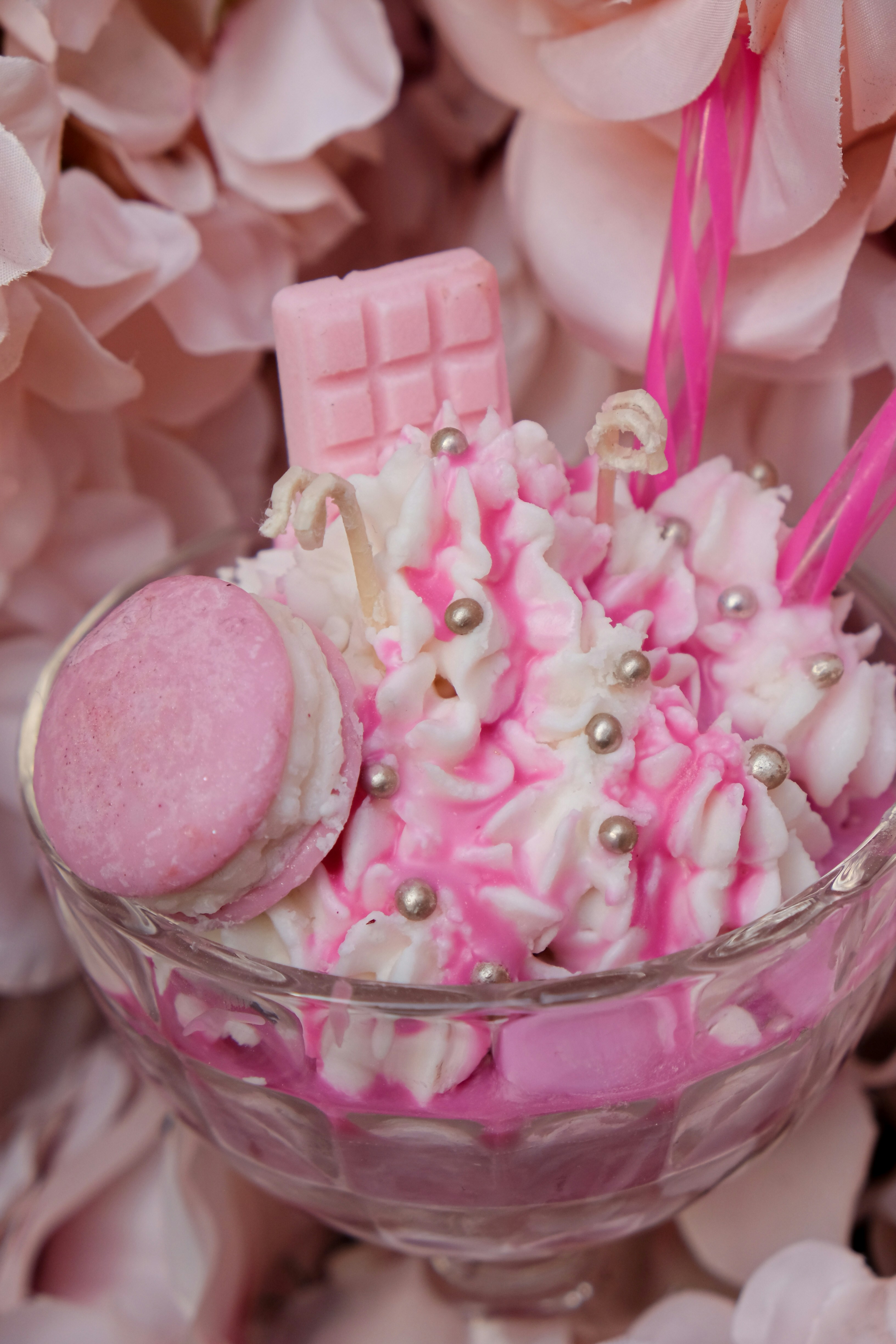 a bowl filled with pink and white marshmallows
