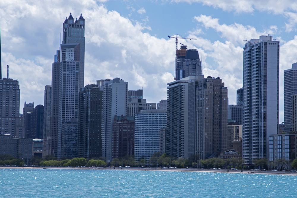 a large body of water surrounded by tall buildings