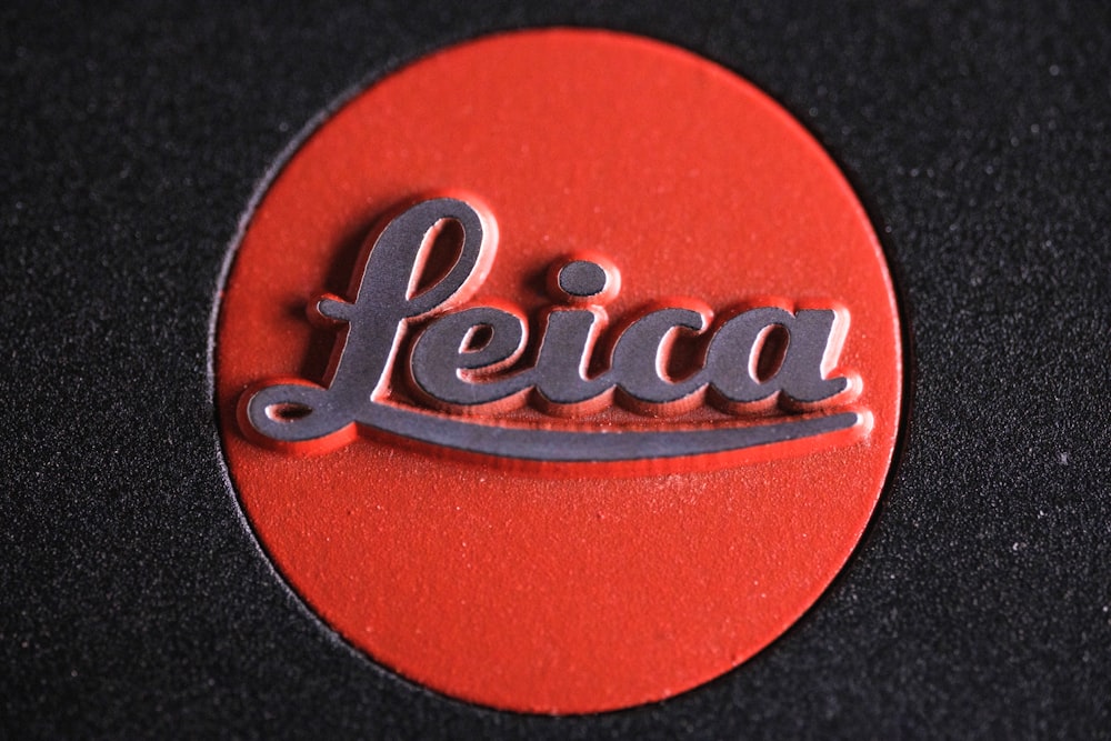 a close up of a piece of paper with the word leica on it