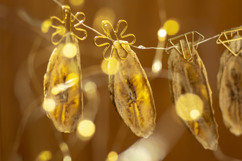 a string of bananas hanging from a clothes line