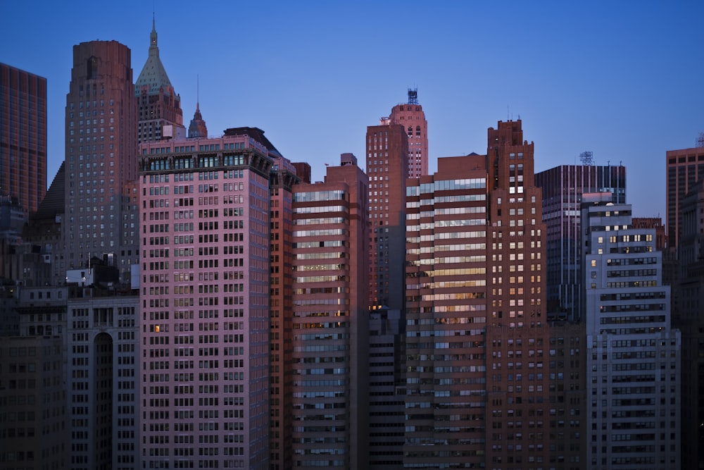 a view of a city skyline at dusk