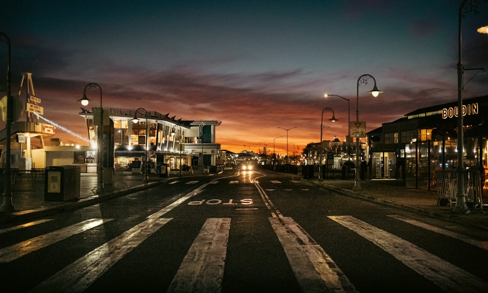 a train is coming down the street