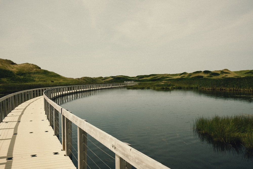 a wooden walkway over a body of water