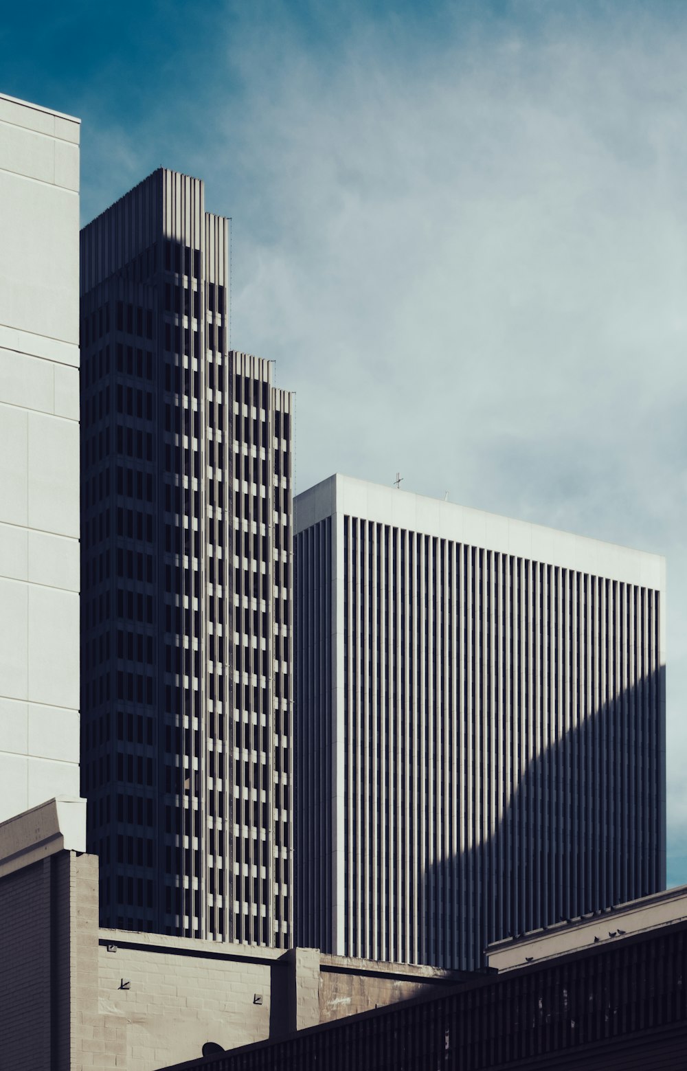 a tall building with a clock on the side of it