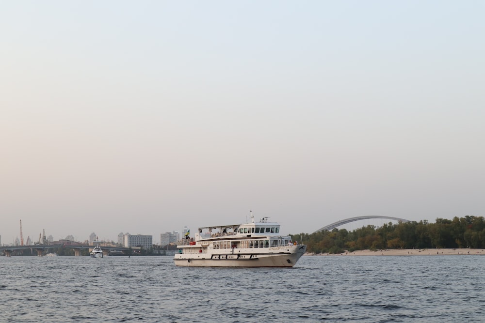 a large boat floating on top of a large body of water