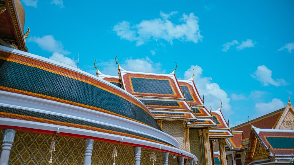 a row of buildings with a sky in the background