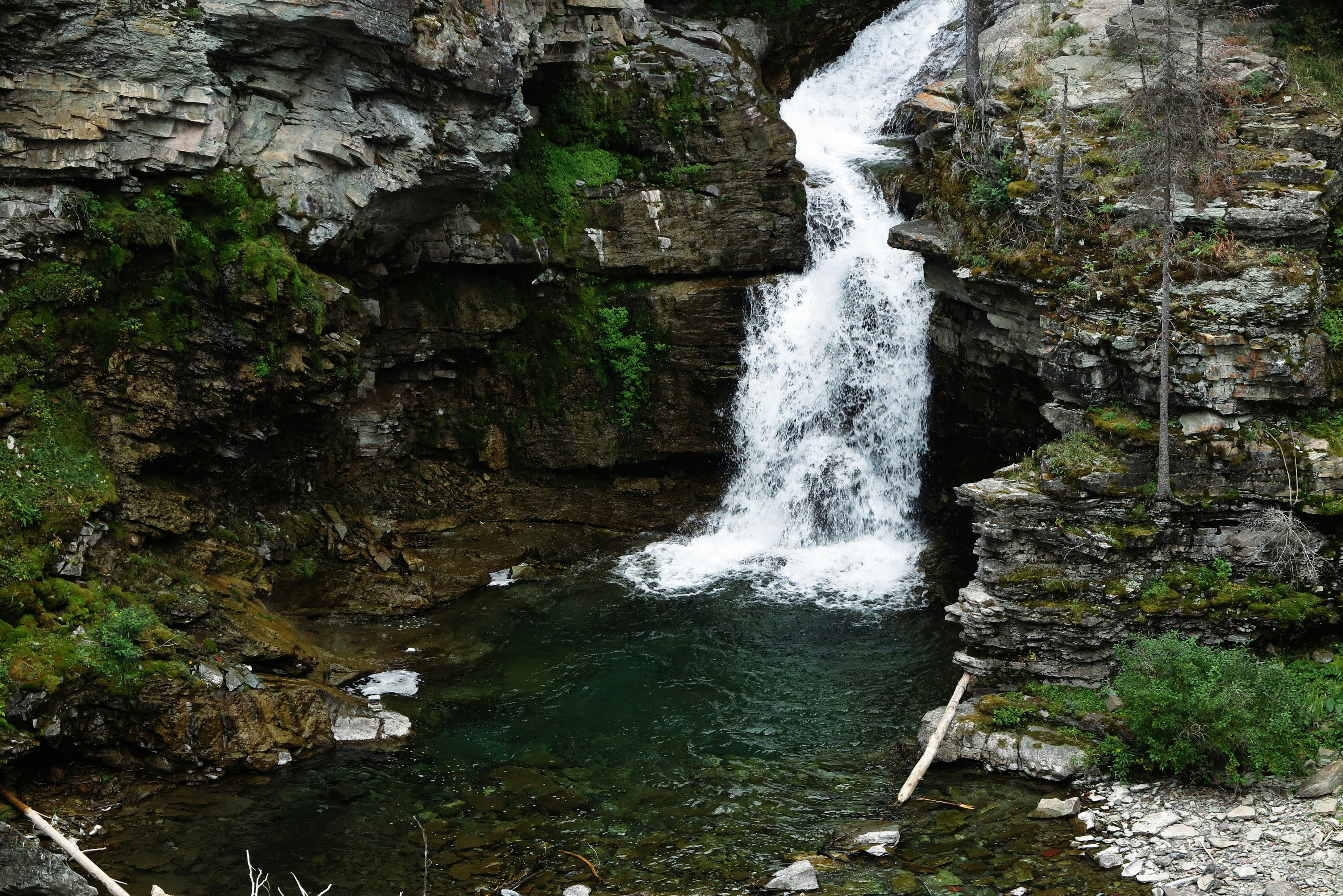 a waterfall with a large amount of water coming out of it