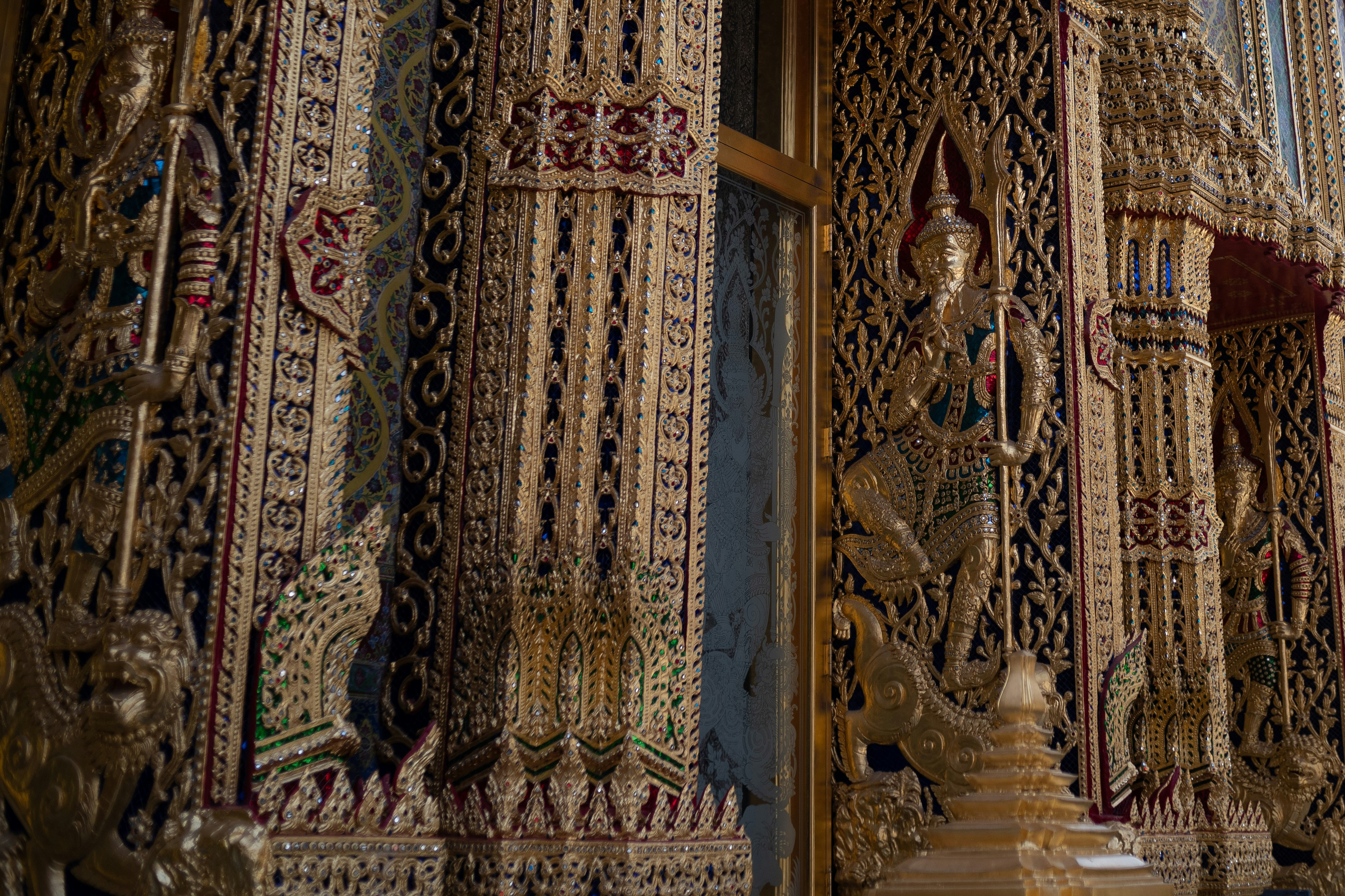 a close up of a window with ornate decorations on it