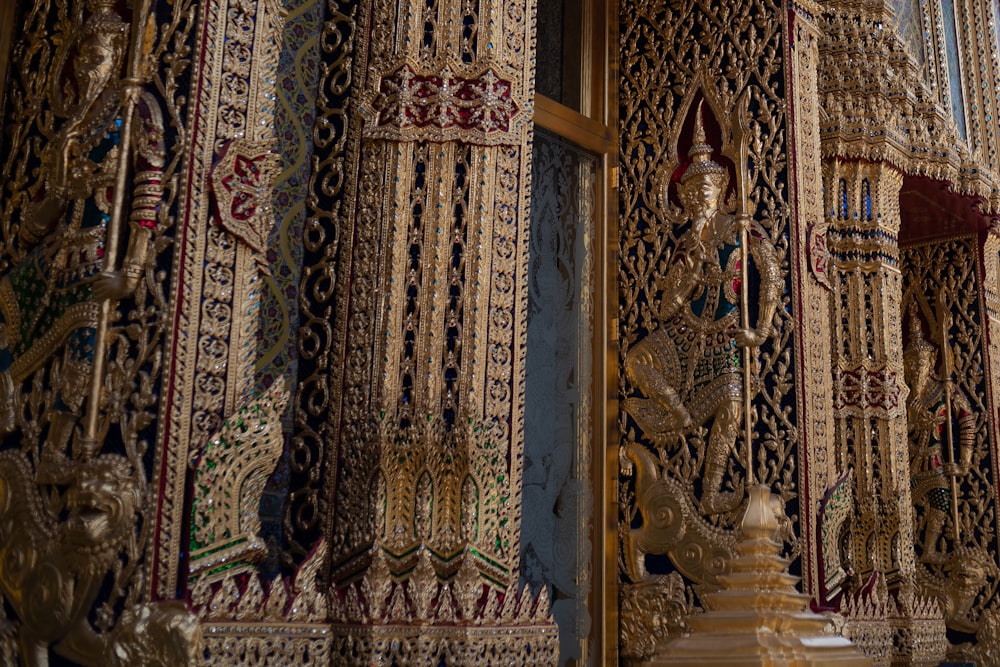 a close up of a window with ornate decorations on it