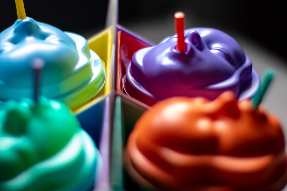 a close up of a cupcake with candles in it