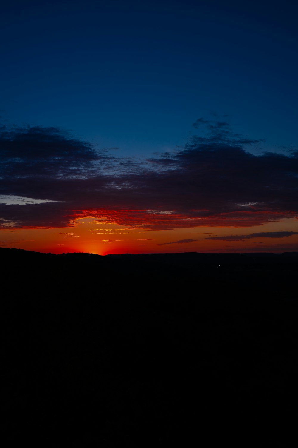 the sun is setting over the horizon of the horizon