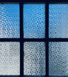 a window that has a bunch of glass on it