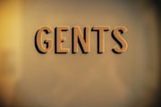 the word gents spelled with cut out letters