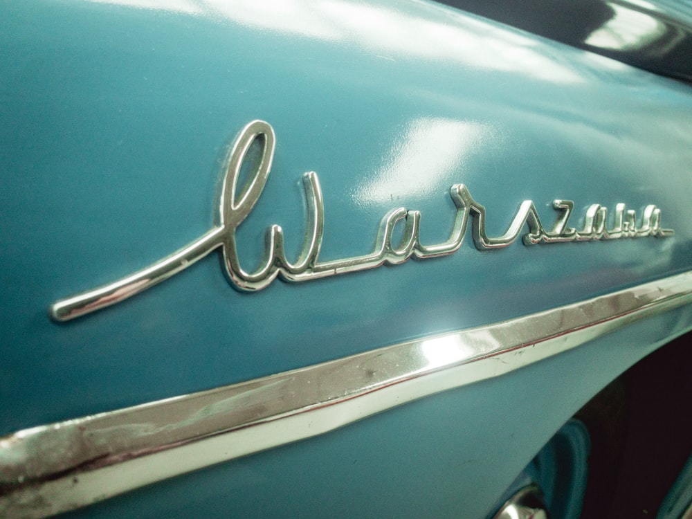 a close up of the name of a classic car