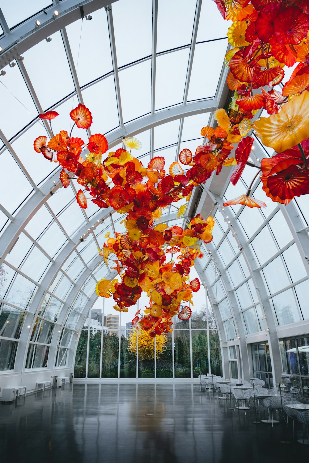 a glass sculpture inside of a glass building