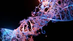 a close up of a blue and purple DNA structure