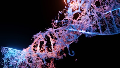A detailed digital depiction of a DNA helix structure, with strands intertwined and illuminated in contrasting hues. The image is set against a dark background, highlighting the bright blues and pinks that represent the complex molecular formation. The strands are intricately detailed, resembling a flowing pattern of dots and lines that suggest motion and energy.