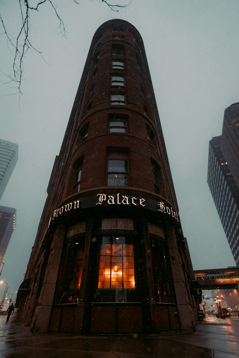 a tall building with a sign on the front of it