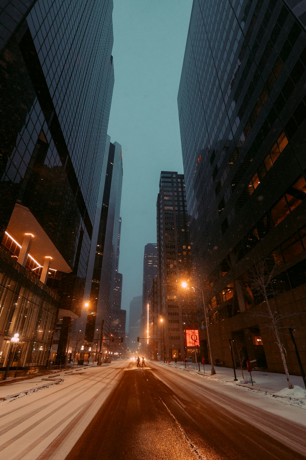 a city street with a lot of tall buildings