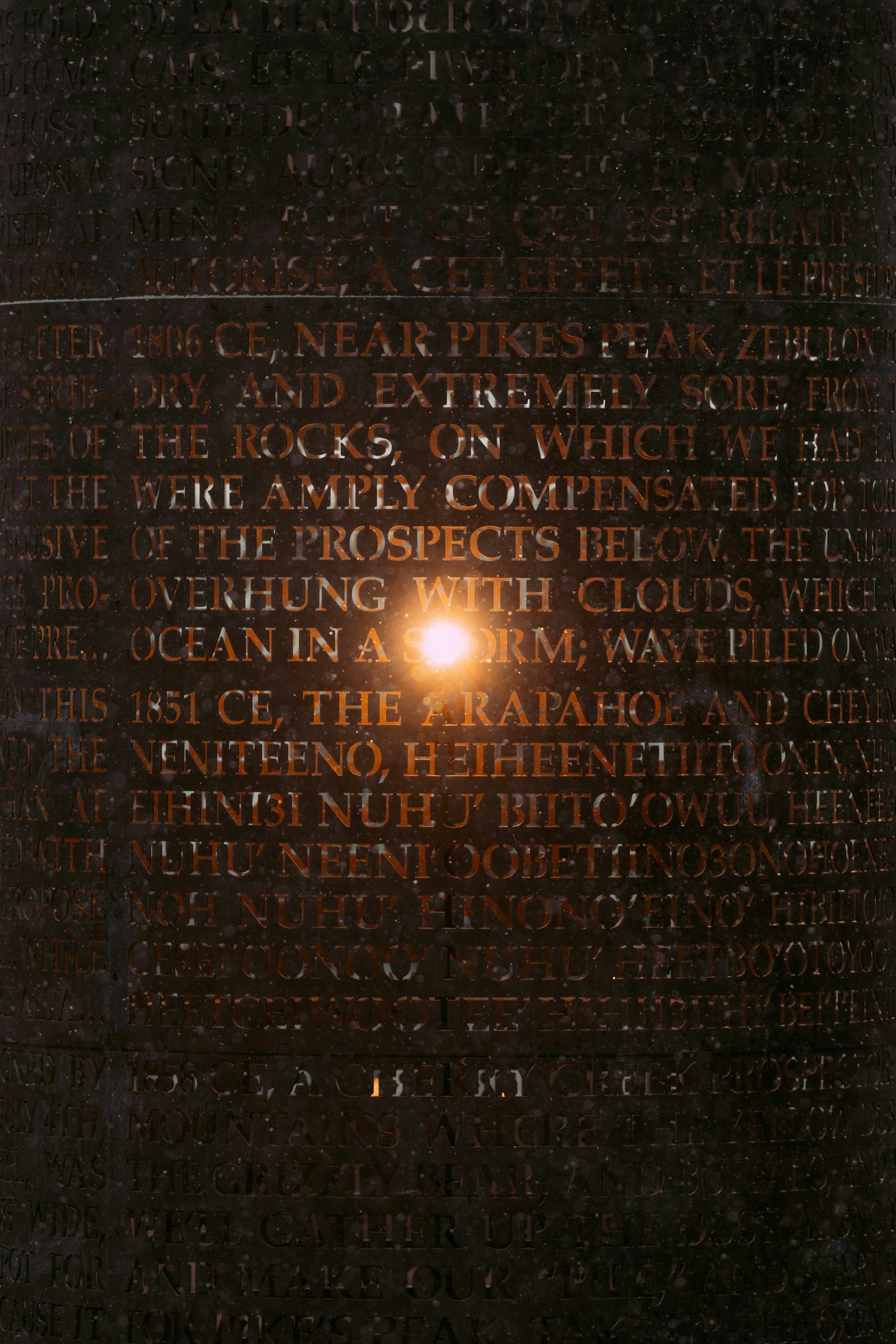 a close up of a wall with a light on it