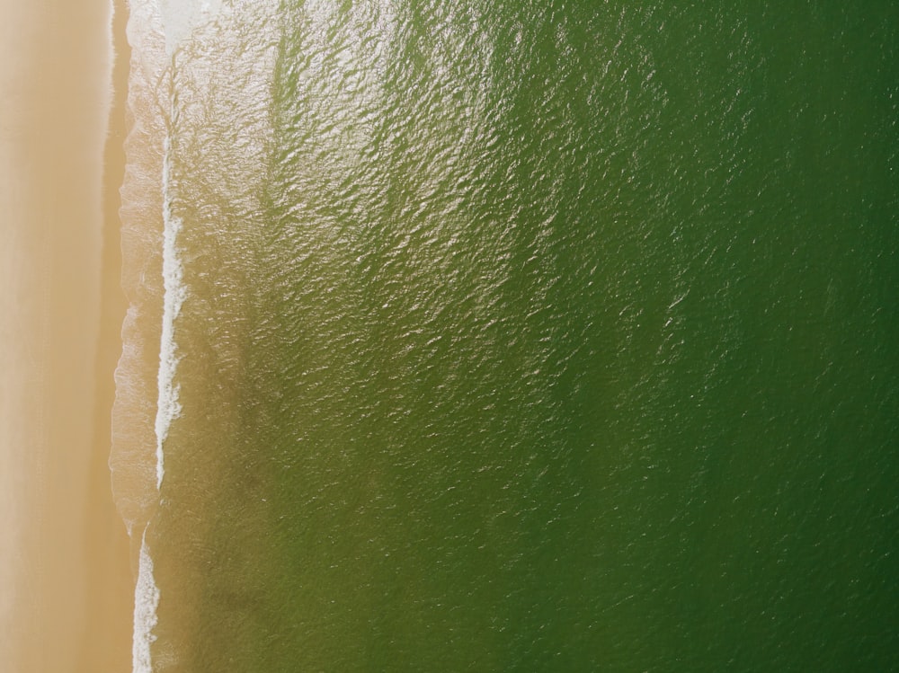 an aerial view of a beach and the ocean