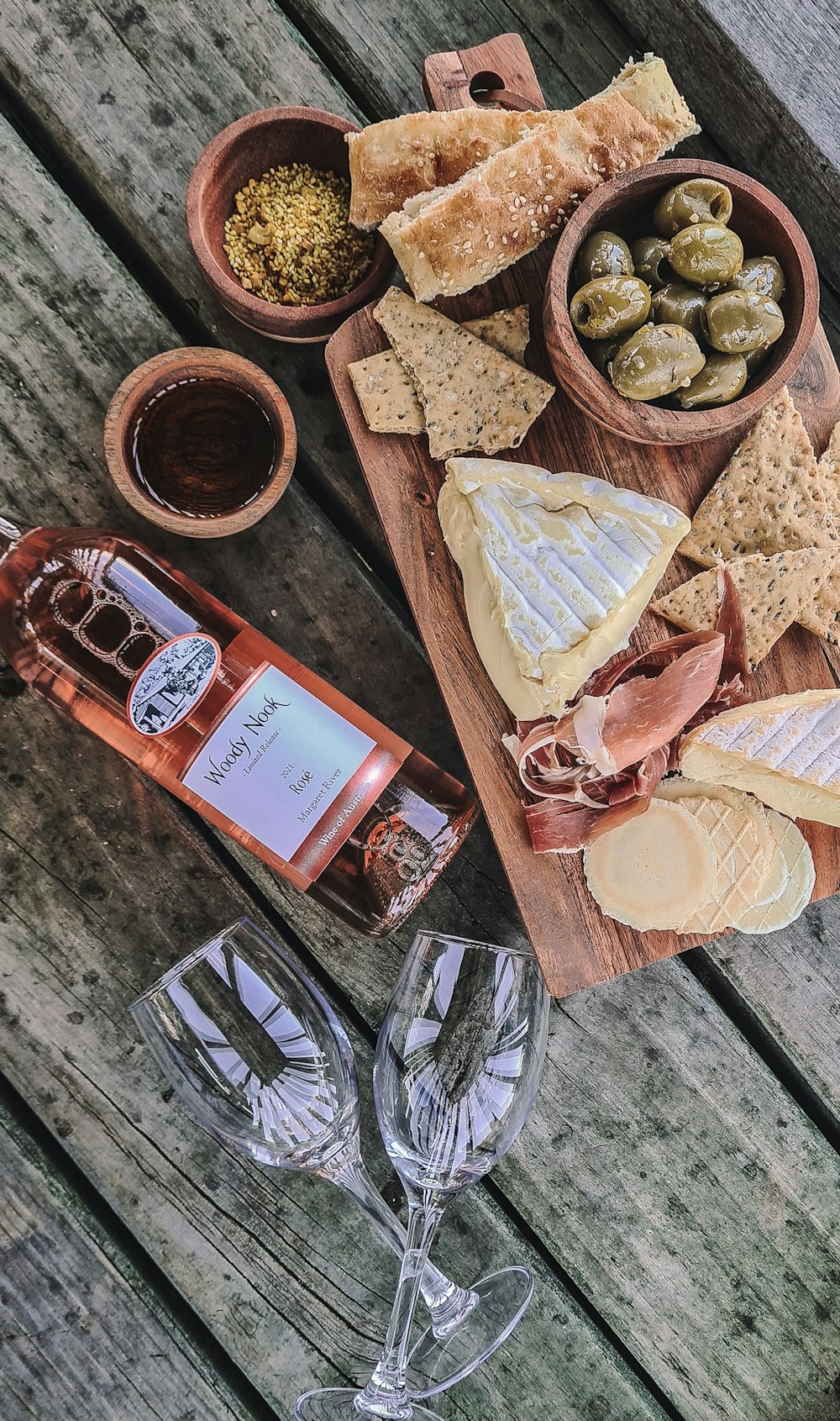 a wooden table topped with different types of food