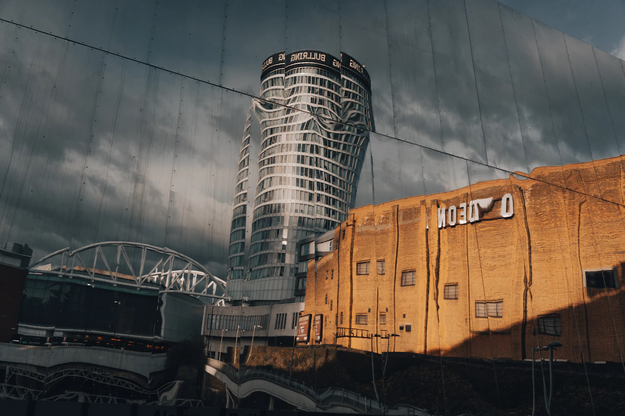 Office buildings reflected in glass in central Birmingham, where EFG Harris Allday has its main office