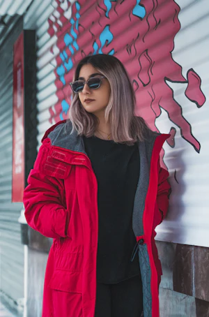 Red jacket against a wall