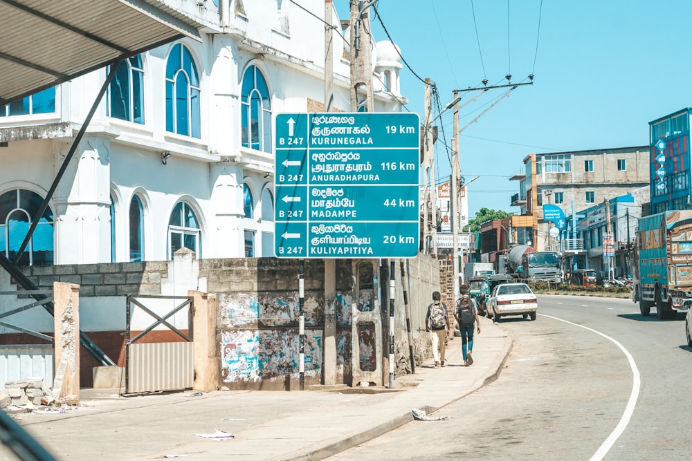 a street sign on the side of a road