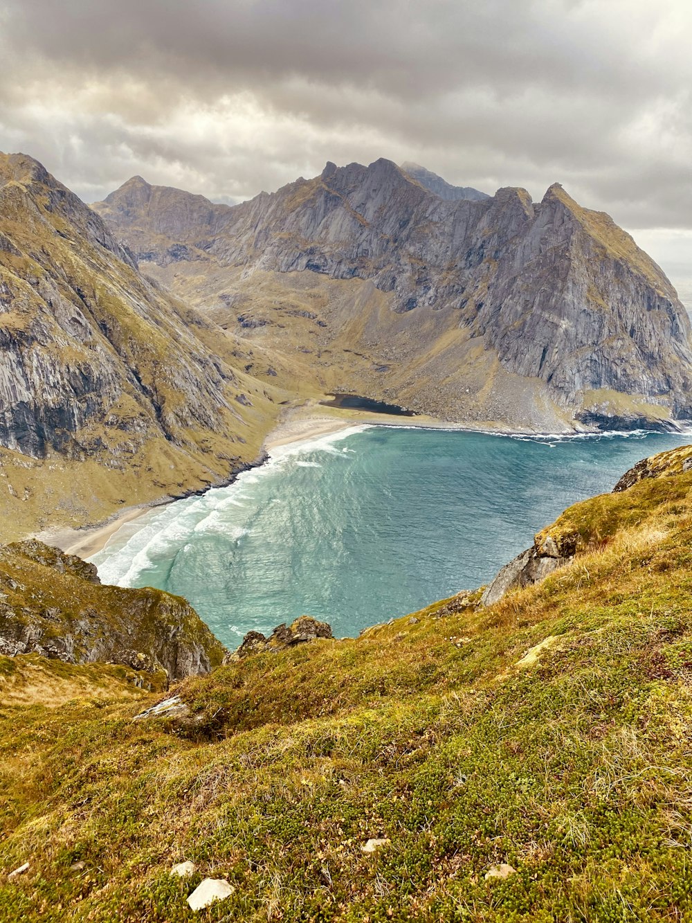 a view of a body of water from a hill