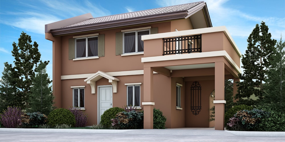 a two story house with a balcony and balconies