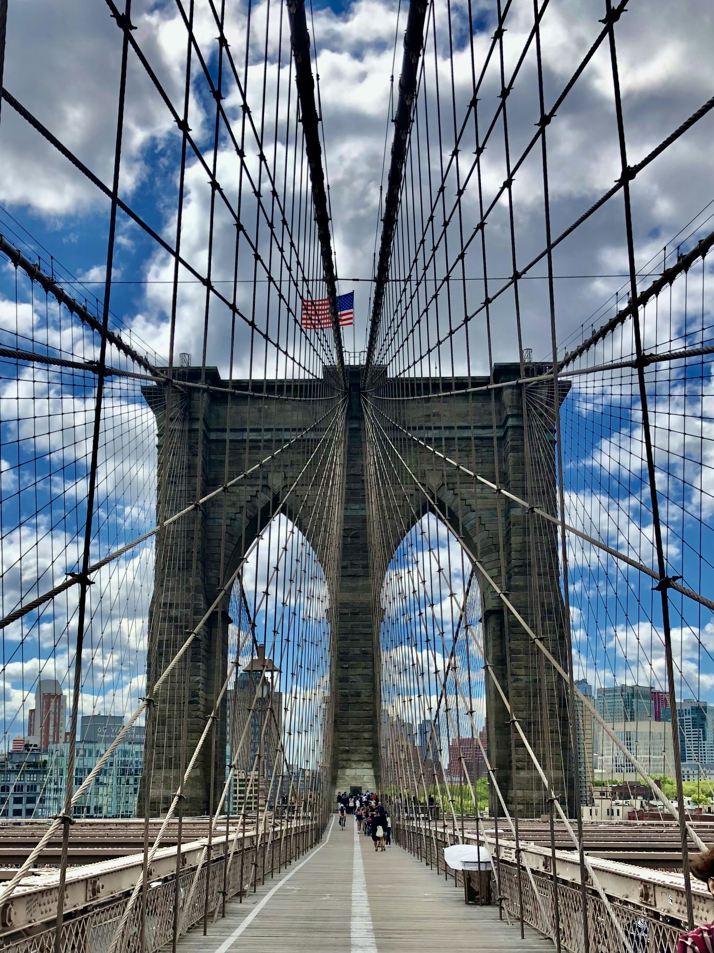 a view of the brooklyn bridge from across the river