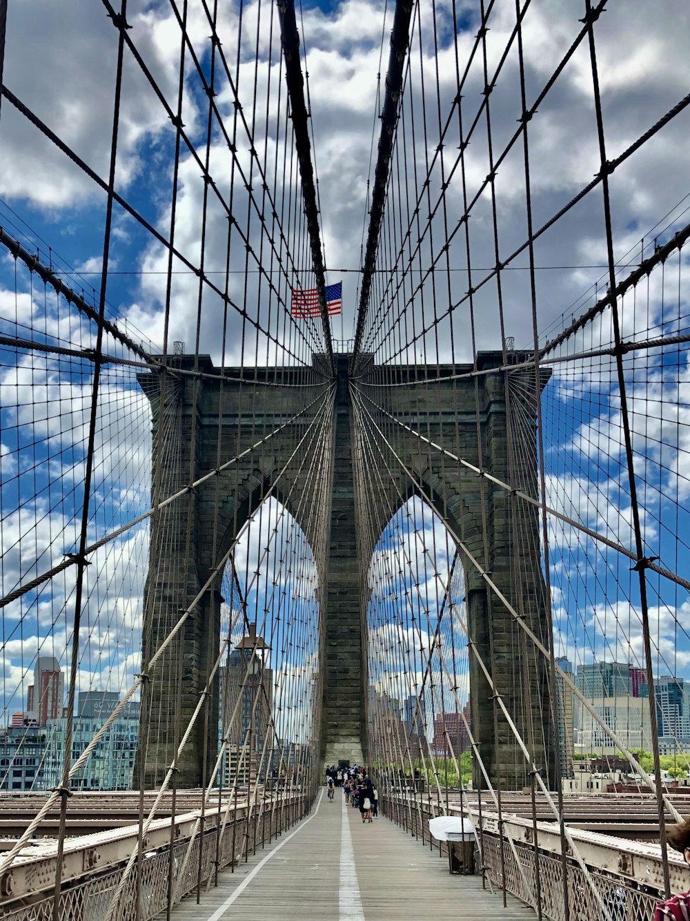 a view of the brooklyn bridge from across the river