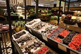 a store filled with lots of fruits and vegetables
