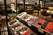 a store filled with lots of fruits and vegetables