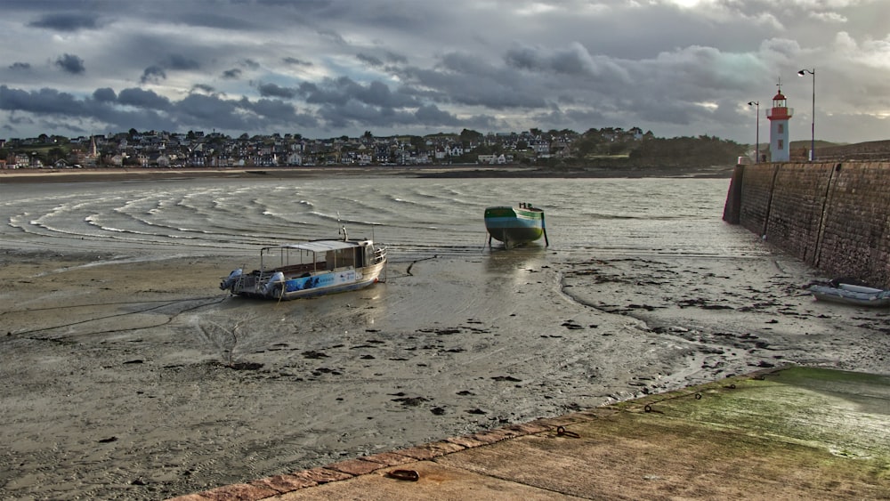 a couple of boats that are sitting in the water