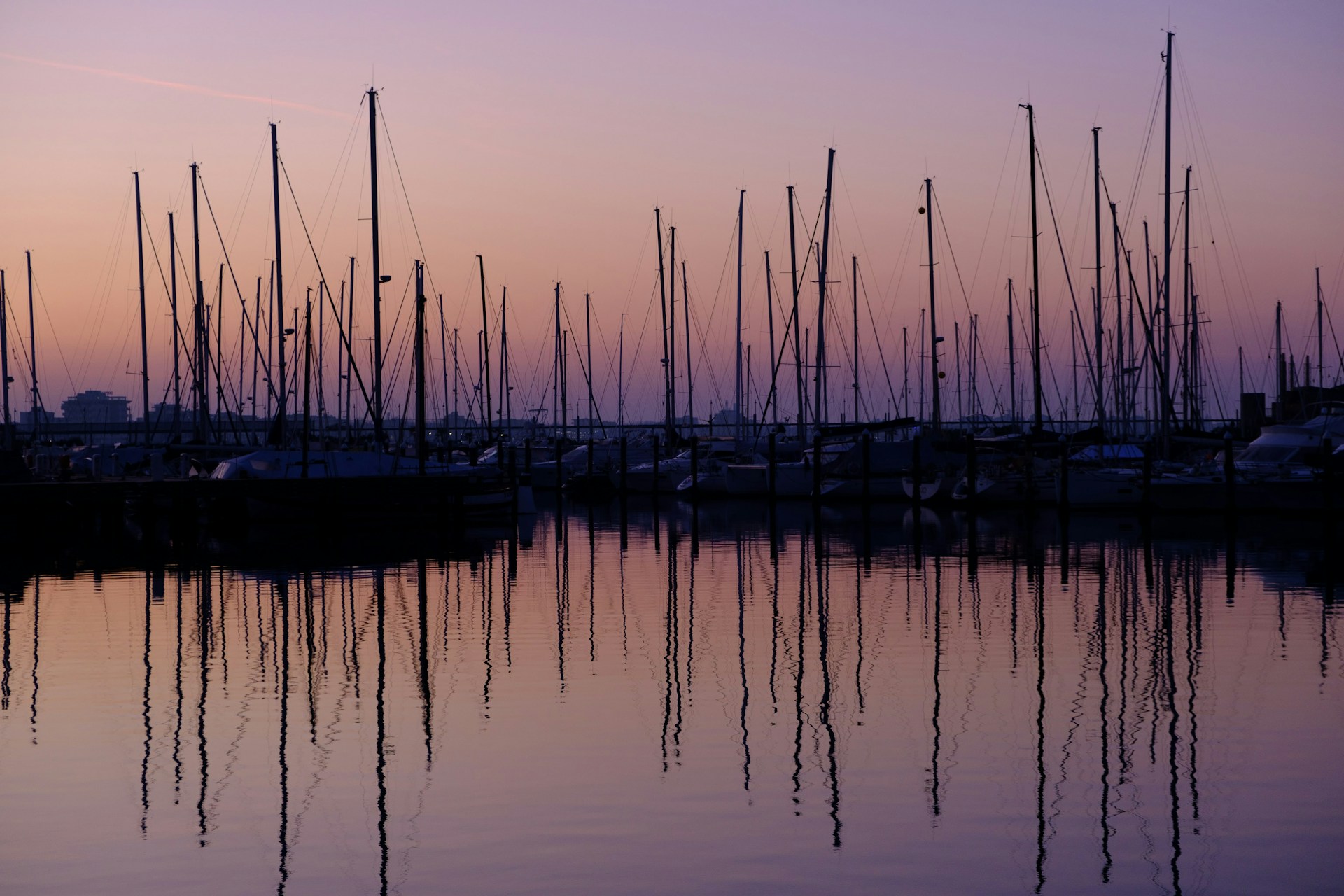 a bunch of boats that are sitting in the water