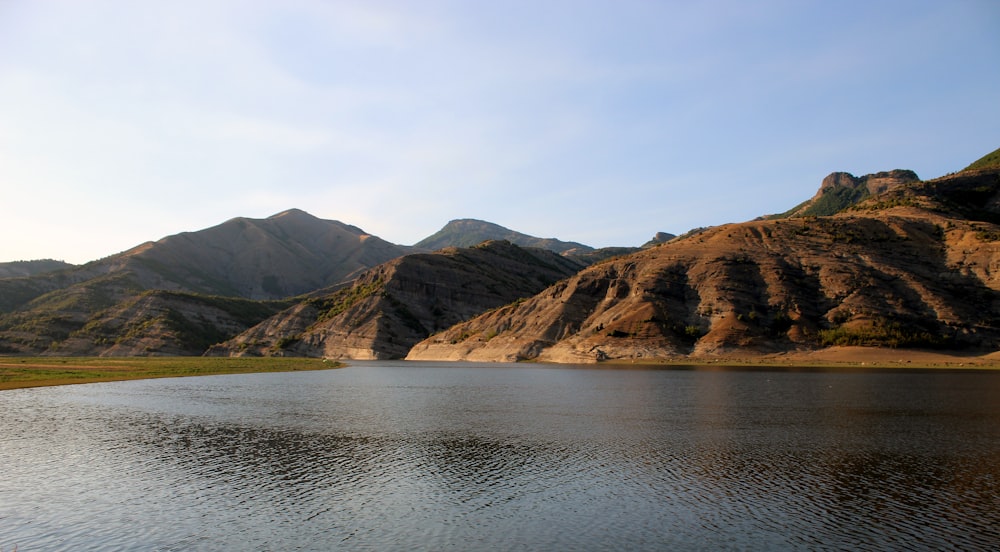 a large body of water surrounded by mountains