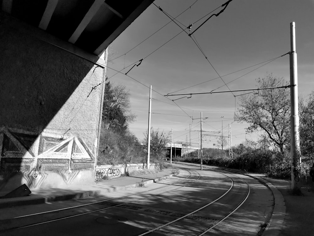 a black and white photo of a train track