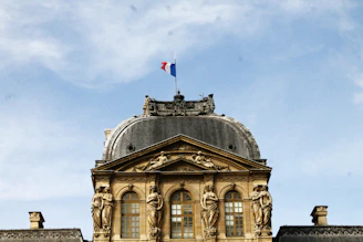 Official government building with navy blue and gold accents, symbolizing trust and authority.