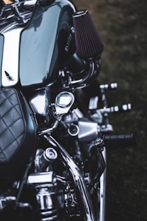 A close-up of a sleek motorcycle highlighting its features.