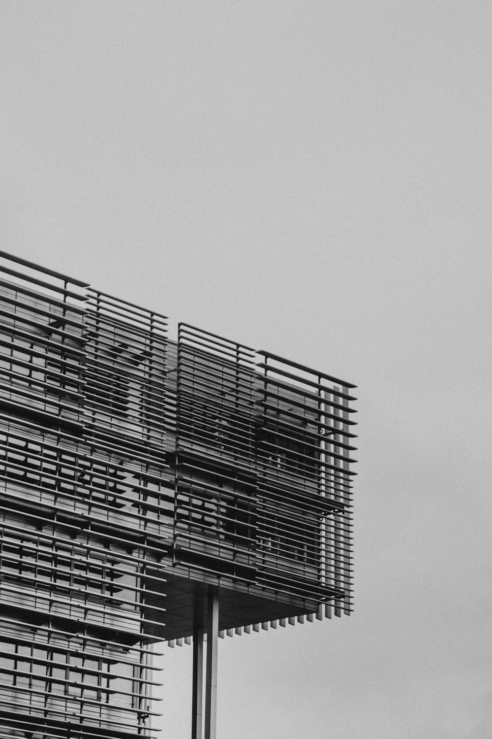 a black and white photo of a tall building