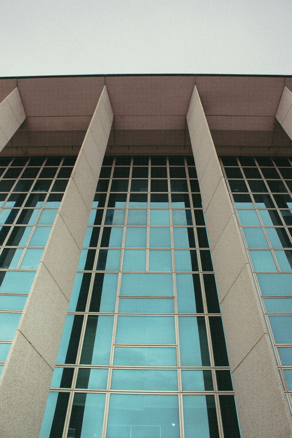 a clock is on the side of a building