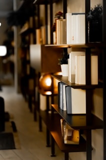 A charming 3D animated scene of a cozy reading nook surrounded by animated plants and glowing books.