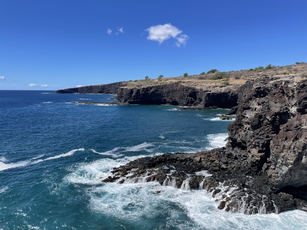 a view of the ocean from a cliff