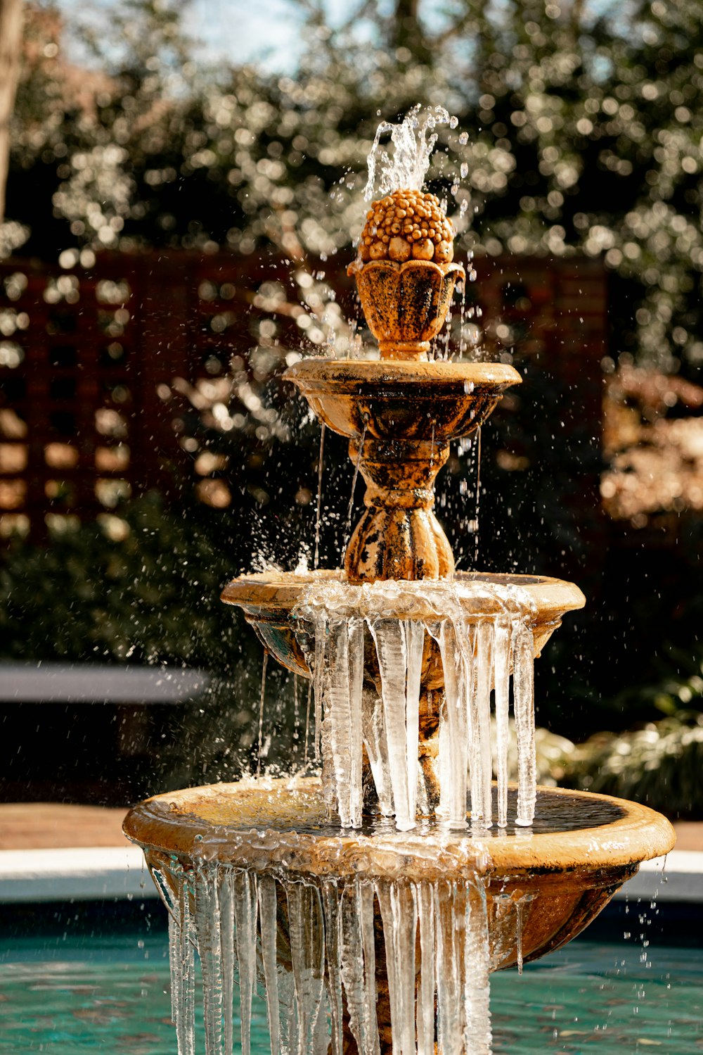 a fountain with water pouring out of it