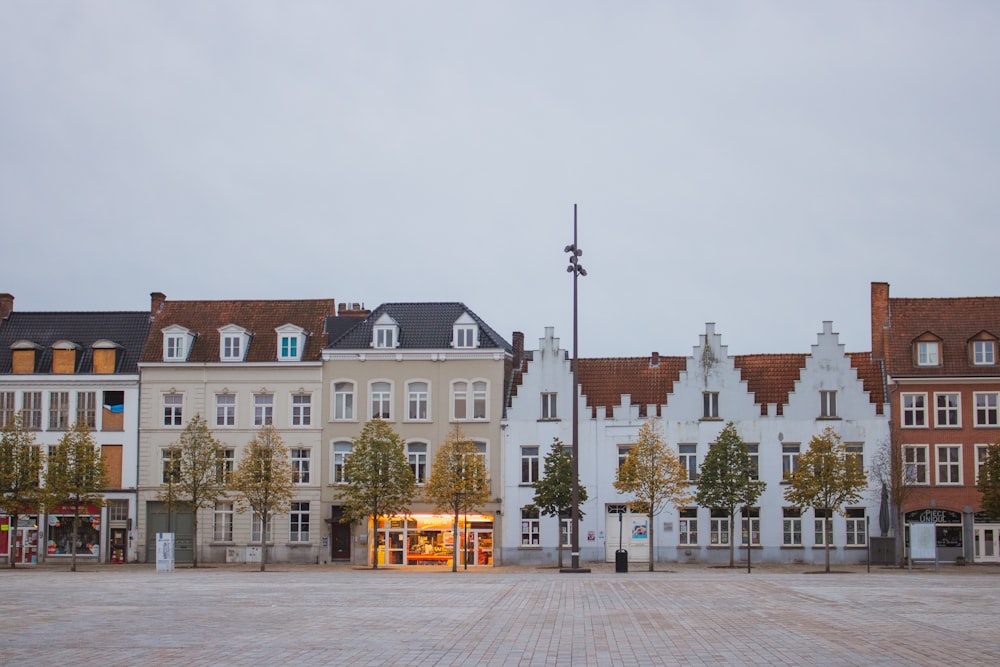 a row of white buildings sitting next to each other