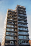 a tall building with balconies and balconies on the balconies