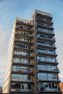 a tall building with balconies and balconies on the balconies